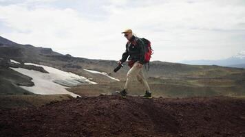 Active Pastime In Weekend, Man Traveling In Mountains, Tourist With Backpack And Camera video