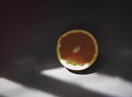 Grapefruit put on background photo
