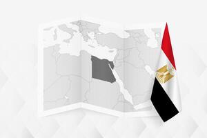 A grayscale map of Egypt with a hanging Egyptian flag on one side. Map for many types of news. vector