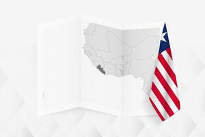 A grayscale map of Liberia with a hanging Liberian flag on one side. Map for many types of news. vector
