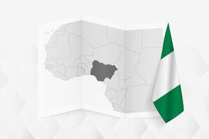 A grayscale map of Nigeria with a hanging Nigerian flag on one side. Map for many types of news. vector
