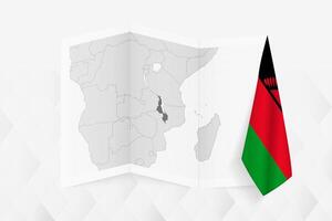 A grayscale map of Malawi with a hanging Malawian flag on one side. Map for many types of news. vector
