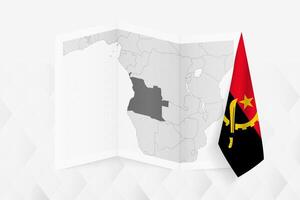 A grayscale map of Angola with a hanging Angolan flag on one side. Map for many types of news. vector