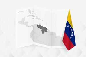 A grayscale map of Venezuela with a hanging Venezuelan flag on one side. Map for many types of news. vector