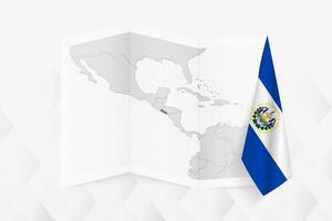 A grayscale map of El Salvador with a hanging Salvadoran flag on one side. Map for many types of news. vector