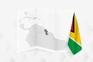 A grayscale map of Guyana with a hanging Guyanese flag on one side. Map for many types of news. vector