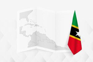 A grayscale map of Saint Kitts and Nevis with a hanging Saint Kitts and Nevis flag on one side. Map for many types of news. vector