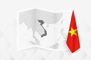 A grayscale map of Vietnam with a hanging Vietnamese flag on one side. Map for many types of news. vector