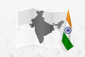A grayscale map of India with a hanging Indian flag on one side. Map for many types of news. vector