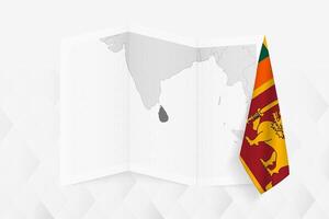 A grayscale map of Sri Lanka with a hanging Sri Lankan flag on one side. Map for many types of news. vector