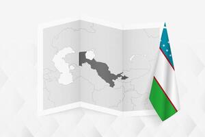 A grayscale map of Uzbekistan with a hanging Uzbekistani flag on one side. Map for many types of news. vector