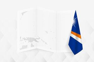 A grayscale map of Marshall Islands with a hanging Marshall Islands flag on one side. Map for many types of news. vector