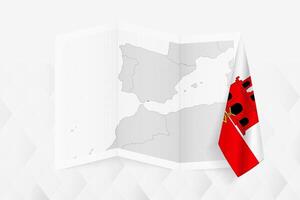 A grayscale map of Gibraltar with a hanging Gibraltar flag on one side. Map for many types of news. vector
