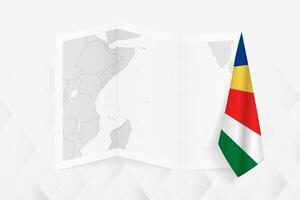 A grayscale map of Seychelles with a hanging Seychelles flag on one side. Map for many types of news. vector