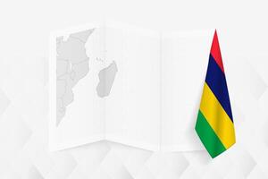 A grayscale map of Mauritius with a hanging Mauritius flag on one side. Map for many types of news. vector