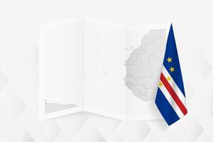 A grayscale map of Cape Verde with a hanging Cape Verde flag on one side. Map for many types of news. vector