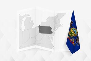 A grayscale map of Pennsylvania with a hanging Pennsylvania flag on one side. Map for many types of news. vector