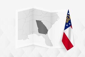 A grayscale map of Georgia with a hanging Georgia flag on one side. Map for many types of news. vector