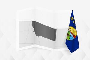 A grayscale map of Montana with a hanging Montana flag on one side. Map for many types of news. vector
