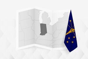 A grayscale map of Indiana with a hanging Indiana flag on one side. Map for many types of news. vector