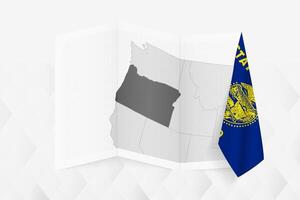 A grayscale map of Oregon with a hanging Oregon flag on one side. Map for many types of news. vector