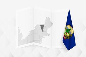 A grayscale map of Vermont with a hanging Vermont flag on one side. Map for many types of news. vector