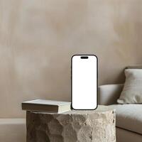 Black titanium smartphone mockup template with blank screen on marble table photo