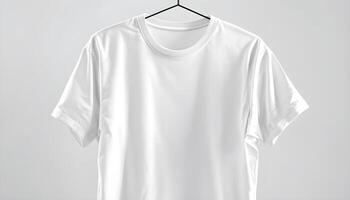 White t - shirt hanging on a hanger photo