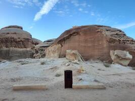 A beautiful view of thousands of years old rocks in the archaeological area of Al Hegra in AlUla, Madain Saleh in Saudi Arabia. photo