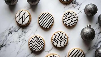 Elegant modern Christmas cookies with minimal frosting and geometric patterns, set against a sleek white marble background. Christmas cookies video