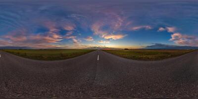 hdri 360 panorama on gravel road among fields in spring nasty evening before sunset in equirectangular full seamless spherical projection, for VR AR virtual reality content photo