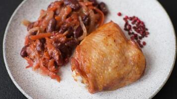 Vegan or vegetarian stew with red beans, onions and carrots or lobio with salt, spices and herbs video