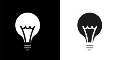 two black and white light bulbs with the same shape vector