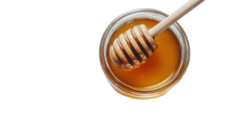 Honey in a jar with a wooden spoon on a black background png