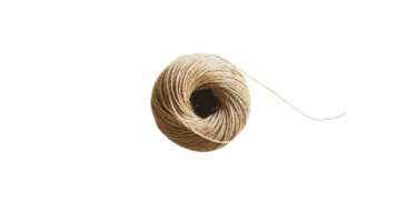 A spool of thread on a black background png