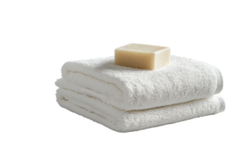 A stack of towels with a soap bar on top png