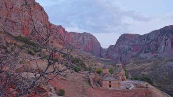 Time lapse panoramic view Noravank monastery complex, 13th-century Armenian monastery. Holy Mother of God church.Noravank at Amaghu. Red cliffs gorge by Arani village. Tourist destination in Armenia video