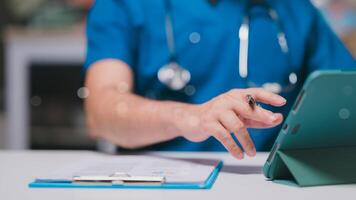 Healthcare professional reviews patient information on tablet, symbolizing integration of technology in modern medicine image highlights efficiency and accessibility of digital health solutions photo