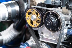 Close-up of high-performance engine precision timing belts and gears, highlighting advanced automotive engineering and design Ideal for enthusiasts and professionals in automotive field photo