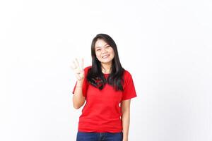 Smiling and showing counting finger, Four Finger Of Beautiful Asian Woman wearing red Isolated On White Background photo