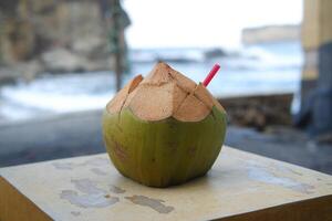 Coconut on the beach. Selective focus photo
