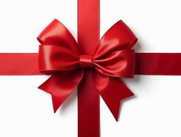 Red satin bow with ribbon isolated on a white background. Elegant gift decoration for holiday, celebration, or packaging design photo