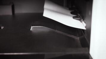 document A4 comes out of the printer after printing video
