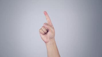 Asian man hand is counting the number from one to nine in asian style. with isolated on white background. video