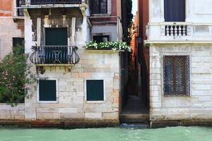 Charming Venetian Architecture That Lines the Picturesque Canal Setting photo