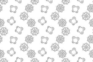 Seamless pattern featuring kaleidoscope-inspired flowers and butterfly-like shapes in black and white for coloring. vector