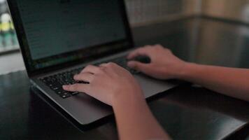 Close-up of hands typing on a laptop keyboard, showing the dedication and focus of a tech professional. This image captures the essence of digital work. video