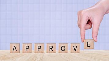 Approve guarantee concept, Approved on wooden cube, accept, pass inspection, approve document and project, Management, examine, business, survey, certification. photo
