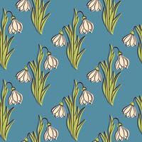 Snowdrops flower on blue background seamless pattern in flat style. Floral print for spring design. vector
