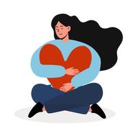 Woman sitting cross-legged and hugging a large heart symbol with happiness vector
